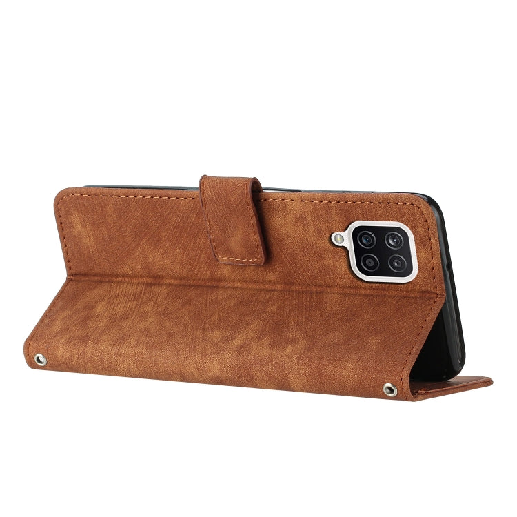 For Samsung Galaxy A12 4G / M12 / F12 4G Skin Feel Stripe Pattern Leather Phone Case with Lanyard(Brown)