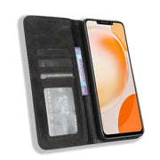 For Huawei Enjoy 60X Magnetic Buckle Retro Texture Leather Phone Case(Black)