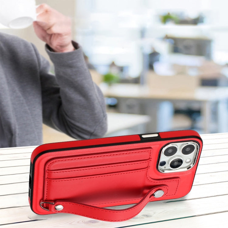 For iPhone 15 Pro Max Shockproof Leather Phone Case with Wrist Strap(Red)