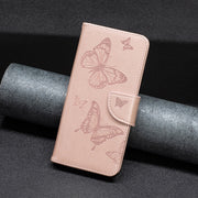 For iPhone 15 Pro Max Embossing Two Butterflies Pattern Leather Phone Case(Rose Gold)